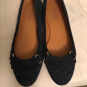 Women’s blue suede shoes.